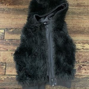 H&M furry hooded vest with two pockets and a hood, size 2.
